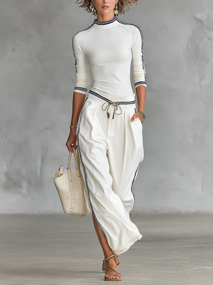 Sport set with wide leg pants & top. Casual loungewear in cream. Front view, full length.